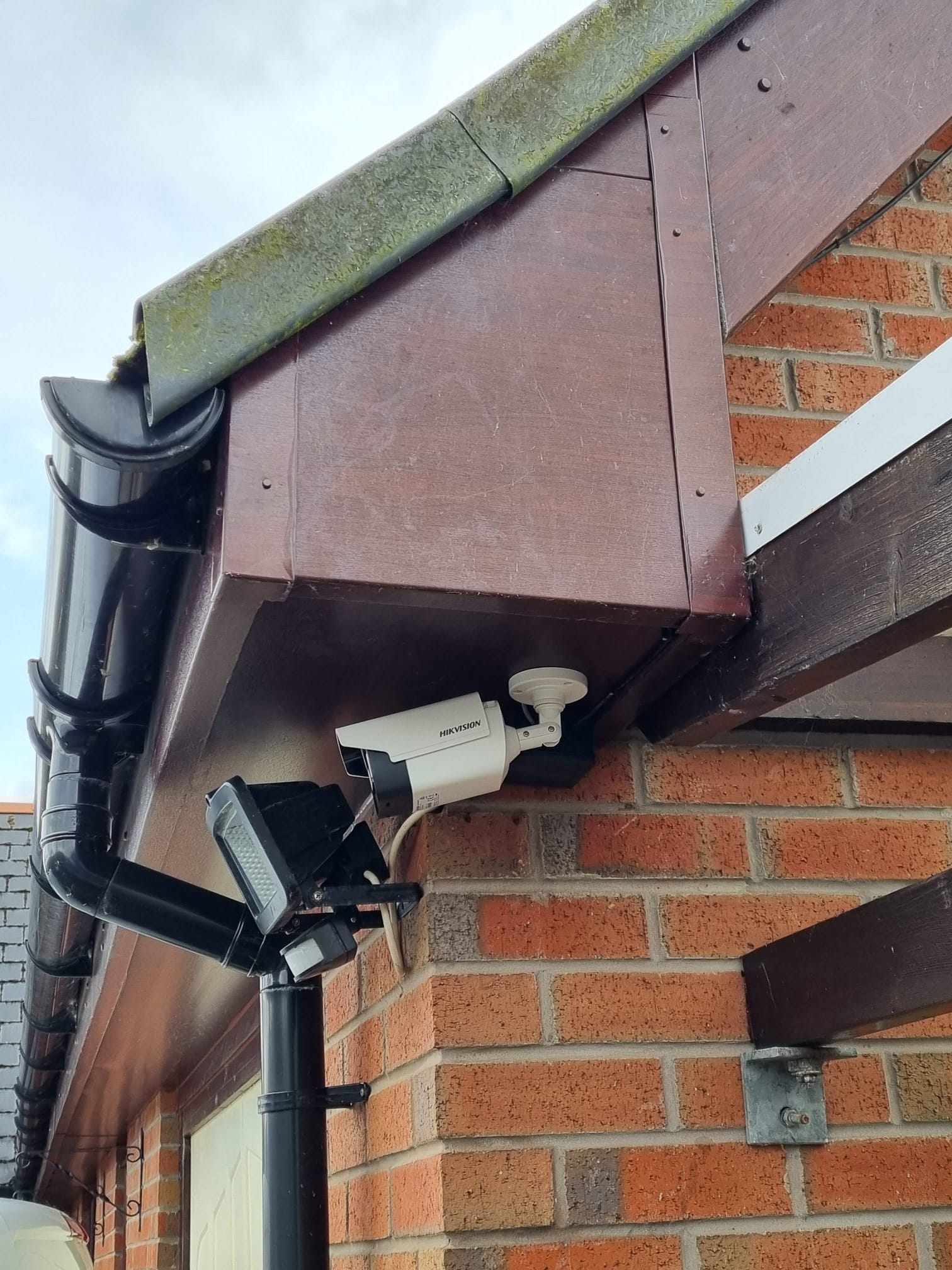 outdoor CCTV camera installed on house exterior for security monitoring